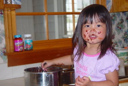 Kasen helping Mommy make brownies
